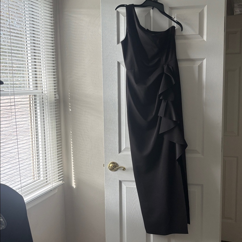 Elegant Black Sleeveless Dress with Ruffle Detail